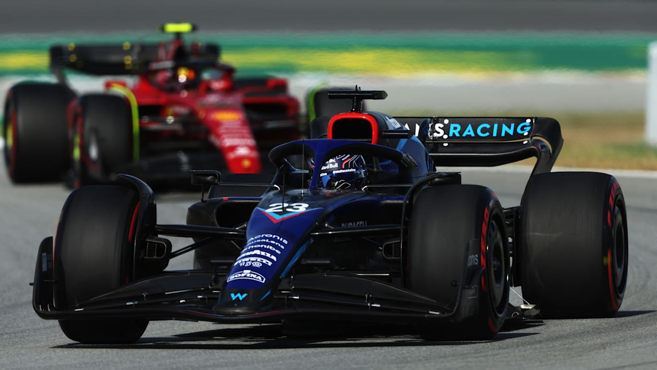 BARCELONA, SPAIN - MAY 20: Alexander Albon of Thailand driving the (23) Williams FW44 Mercedes leads Carlos Sainz of Spain driving (55) the Ferrari F1-75 during practice ahead of the F1 Grand Prix of Spain at Circuit de Barcelona-Catalunya on May 20, 2022 in Barcelona, Spain. (Photo by Bryn Lennon - Formula 1/Formula 1 via Getty Images)