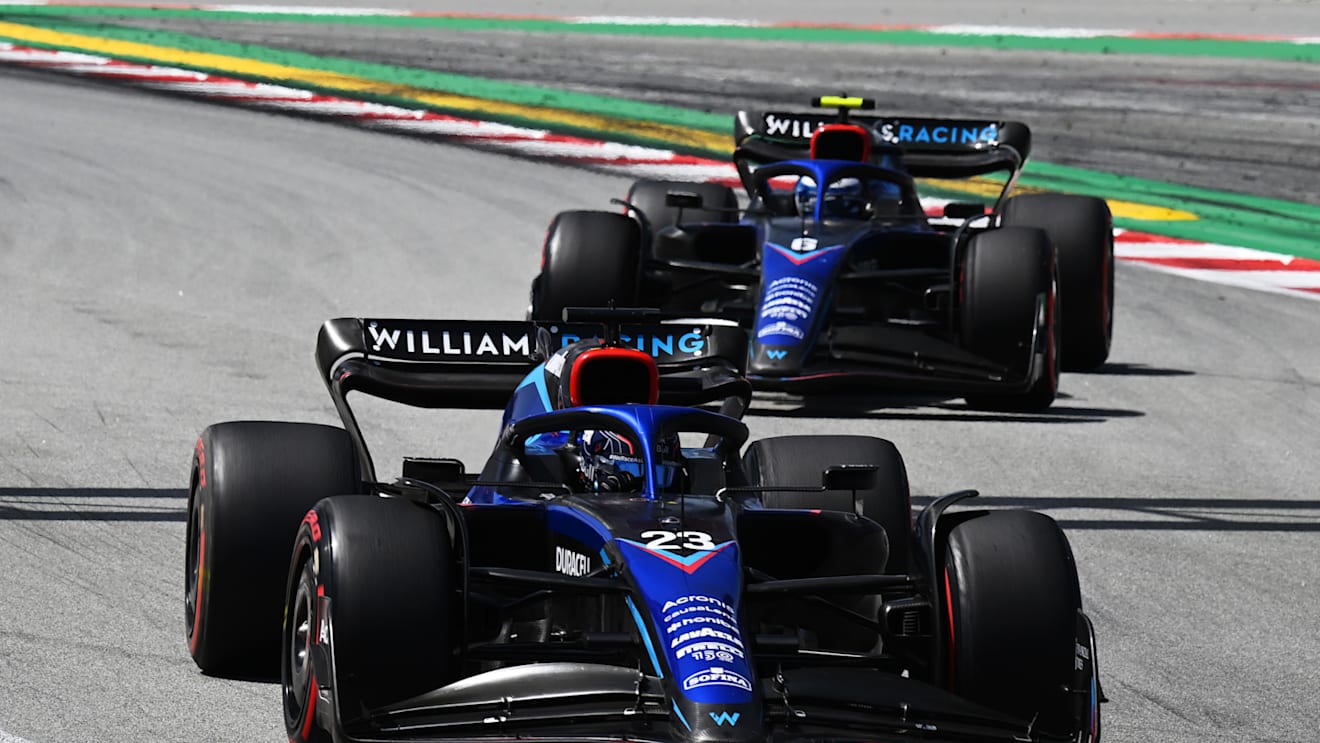 BARCELONA, SPAIN - MAY 22: Alexander Albon of Thailand driving the (23) Williams FW44 Mercedes leads Nicholas Latifi of Canada driving the (6) Williams FW44 Mercedes during the F1 Grand Prix of Spain at Circuit de Barcelona-Catalunya on May 22, 2022 in Barcelona, Spain. (Photo by Clive Mason/Getty Images)