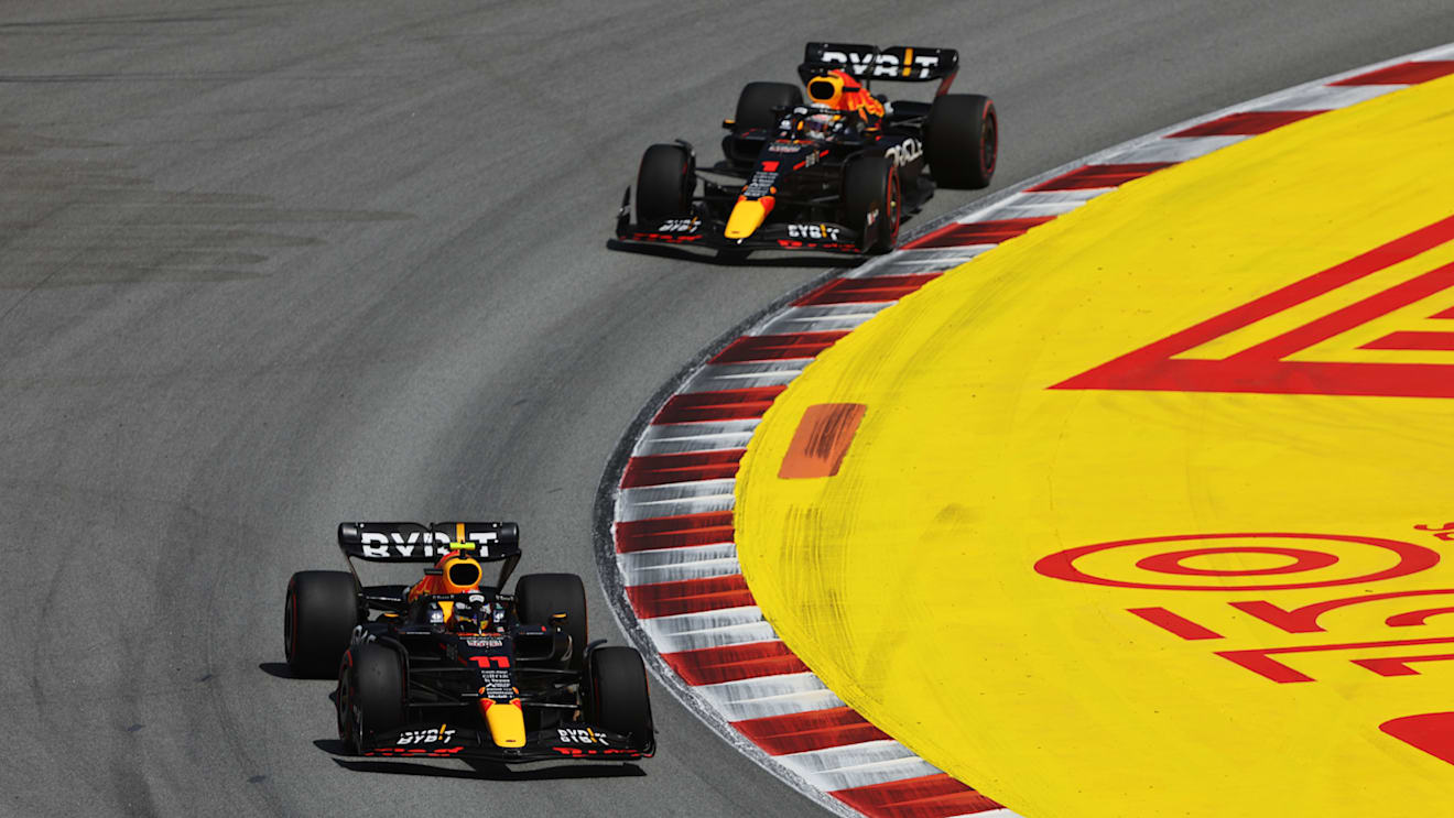 BARCELONA, SPAIN - MAY 22: Sergio Perez of Mexico driving the (11) Oracle Red Bull Racing RB18 leads Max Verstappen of the Netherlands driving the (1) Oracle Red Bull Racing RB18 during the F1 Grand Prix of Spain at Circuit de Barcelona-Catalunya on May 22, 2022 in Barcelona, Spain. (Photo by Bryn Lennon - Formula 1/Formula 1 via Getty Images)