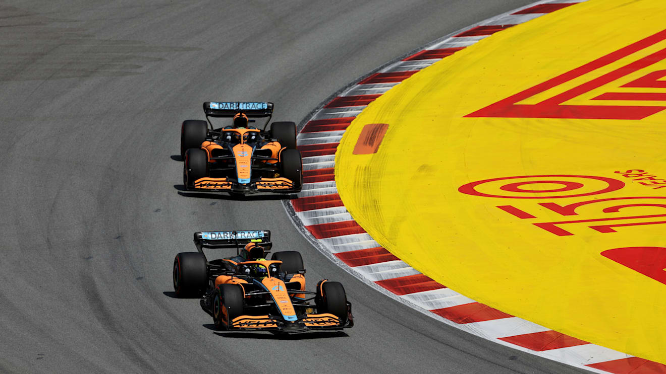 BARCELONA, SPAIN - MAY 22: Lando Norris of Great Britain driving the (4) McLaren MCL36 Mercedes leads Daniel Ricciardo of Australia driving the (3) McLaren MCL36 Mercedes during the F1 Grand Prix of Spain at Circuit de Barcelona-Catalunya on May 22, 2022 in Barcelona, Spain. (Photo by Bryn Lennon - Formula 1/Formula 1 via Getty Images)