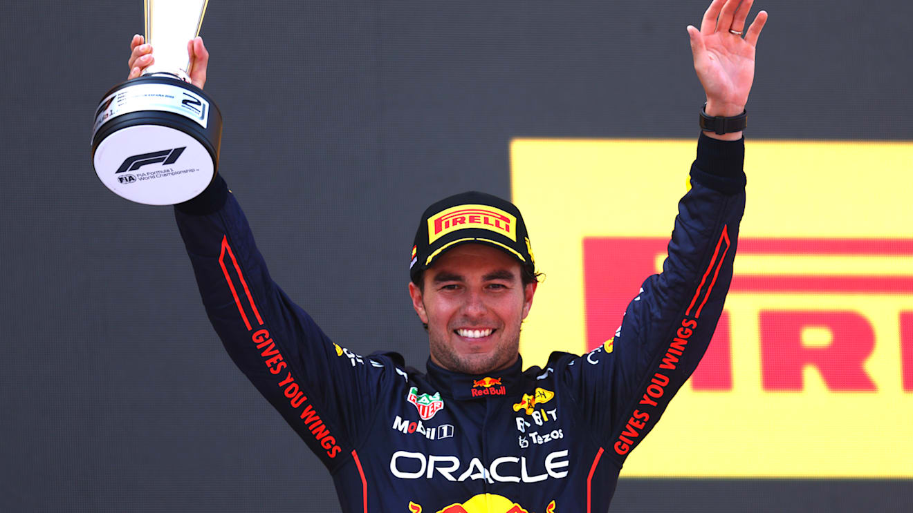 BARCELONA, SPAIN - MAY 22: Second placed Sergio Perez of Mexico and Oracle Red Bull Racing celebrates on the podium during the F1 Grand Prix of Spain at Circuit de Barcelona-Catalunya on May 22, 2022 in Barcelona, Spain. (Photo by Alex Pantling - Formula 1/Formula 1 via Getty Images)