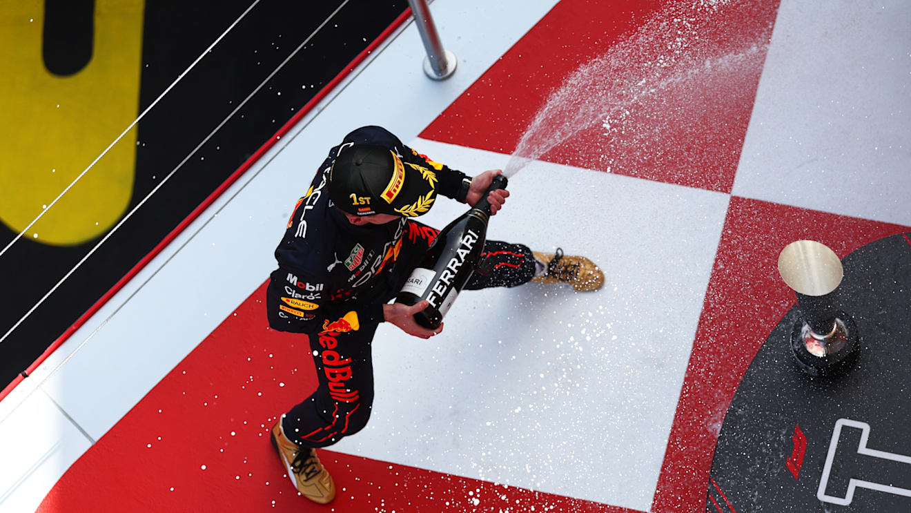 BARCELONA, SPAIN - MAY 22: Race winner Max Verstappen of the Netherlands and Oracle Red Bull Racing celebrates on the podium during the F1 Grand Prix of Spain at Circuit de Barcelona-Catalunya on May 22, 2022 in Barcelona, Spain. (Photo by Lars Baron/Getty Images)