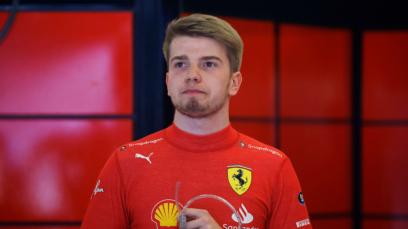 AUSTIN, TEXAS - OCTOBER 21: Robert Shwartzman of Israel and Ferrari looks on from the garage during practice ahead of the F1 Grand Prix of USA at Circuit of The Americas on October 21, 2022 in Austin, Texas. (Photo by Chris Graythen/Getty Images)
