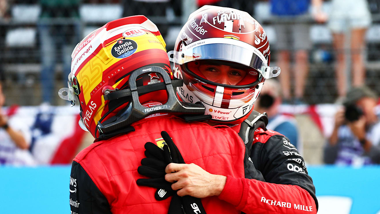 AUSTIN, TEXAS - OCTOBER 22: Pole position qualifier Carlos Sainz of Spain and Ferrari and Second placed qualifier Charles Leclerc of Monaco and Ferrari celebrate in parc ferme during qualifying ahead of the F1 Grand Prix of USA at Circuit of The Americas on October 22, 2022 in Austin, Texas. (Photo by Mark Thompson/Getty Images )