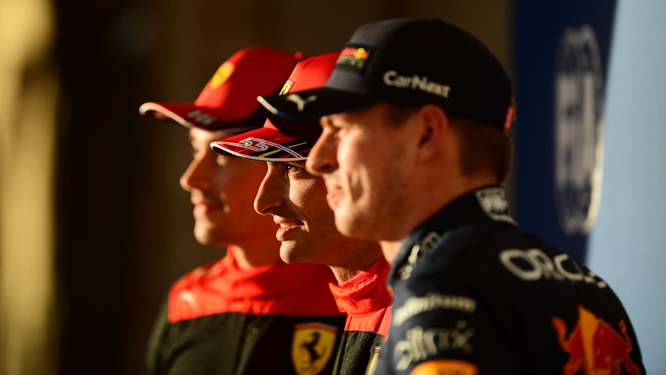 AUSTIN, TEXAS - OCTOBER 22: Pole position qualifier Carlos Sainz of Spain and Ferrari (C), Second placed qualifier Charles Leclerc of Monaco and Ferrari (L) and Third placed qualifier Max Verstappen of the Netherlands and Oracle Red Bull Racing (R) pose for a photo in parc ferme during qualifying ahead of the F1 Grand Prix of USA at Circuit of The Americas on October 22, 2022 in Austin, Texas. (Photo by Mario Renzi - Formula 1/Formula 1 via Getty Images)