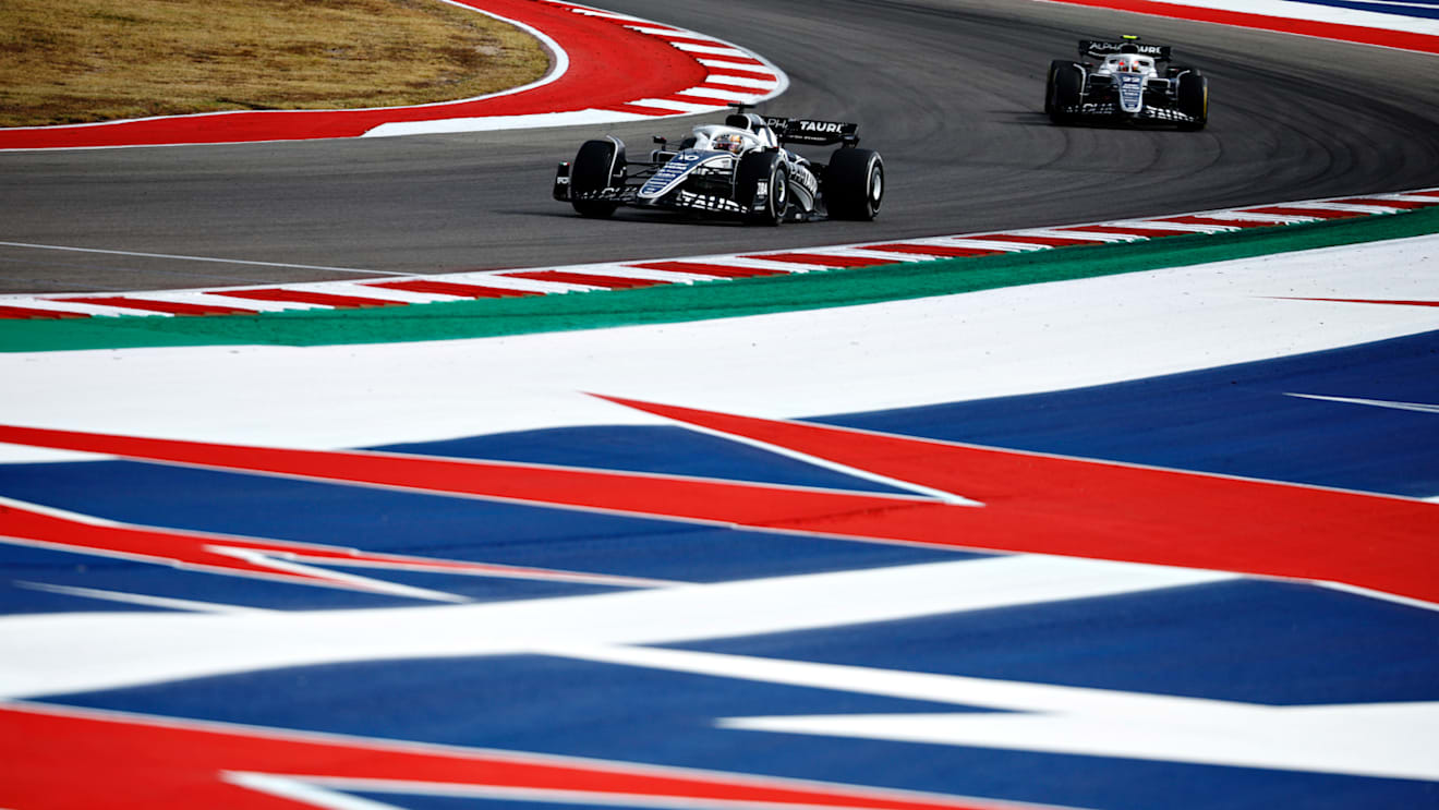 AUSTIN, TEXAS - OCTOBER 23: Pierre Gasly of France driving the (10) Scuderia AlphaTauri AT03 leads Yuki Tsunoda of Japan driving the (22) Scuderia AlphaTauri AT03 during the F1 Grand Prix of USA at Circuit of The Americas on October 23, 2022 in Austin, Texas. (Photo by Chris Graythen/Getty Images)