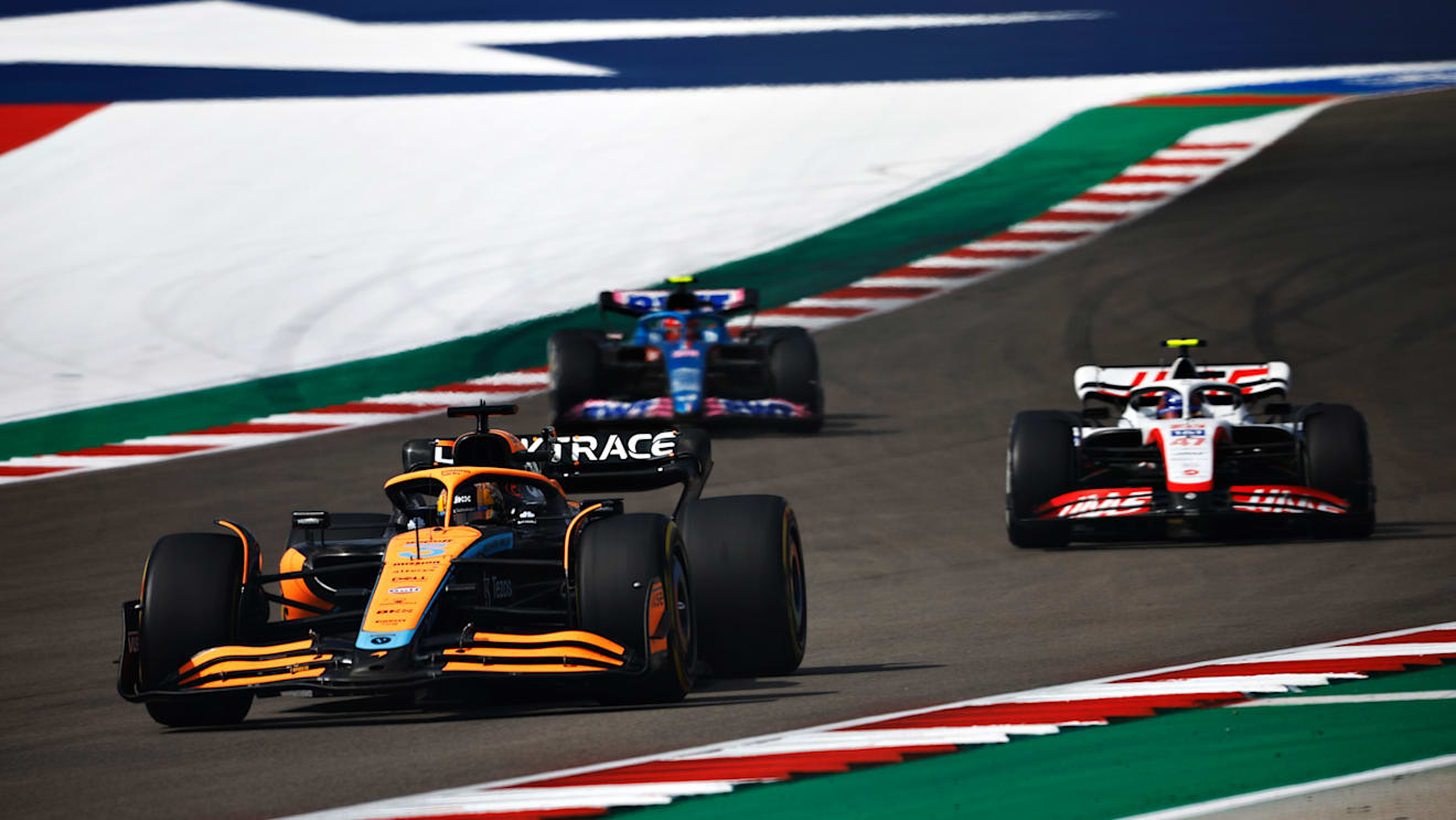 AUSTIN, TEXAS - OCTOBER 23: Daniel Ricciardo of Australia driving the (3) McLaren MCL36 Mercedes leads Mick Schumacher of Germany driving the (47) Haas F1 VF-22 Ferrari and Esteban Ocon of France driving the (31) Alpine F1 A522 Renault on track during the F1 Grand Prix of USA at Circuit of The Americas on October 23, 2022 in Austin, Texas. (Photo by Chris Graythen/Getty Images)