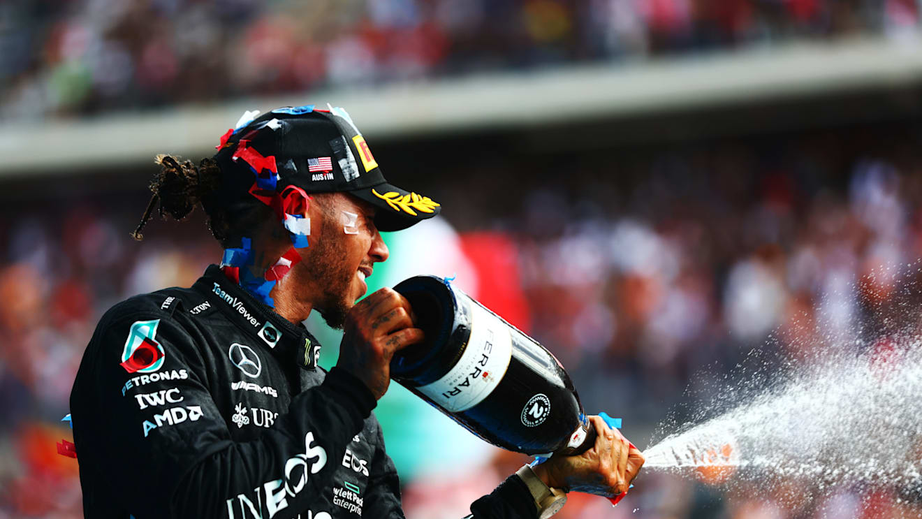 AUSTIN, TEXAS - OCTOBER 23: Second placed Lewis Hamilton of Great Britain and Mercedes celebrates on the podium following the F1 Grand Prix of USA at Circuit of The Americas on October 23, 2022 in Austin, Texas. (Photo by Dan Istitene - Formula 1/Formula 1 via Getty Images)