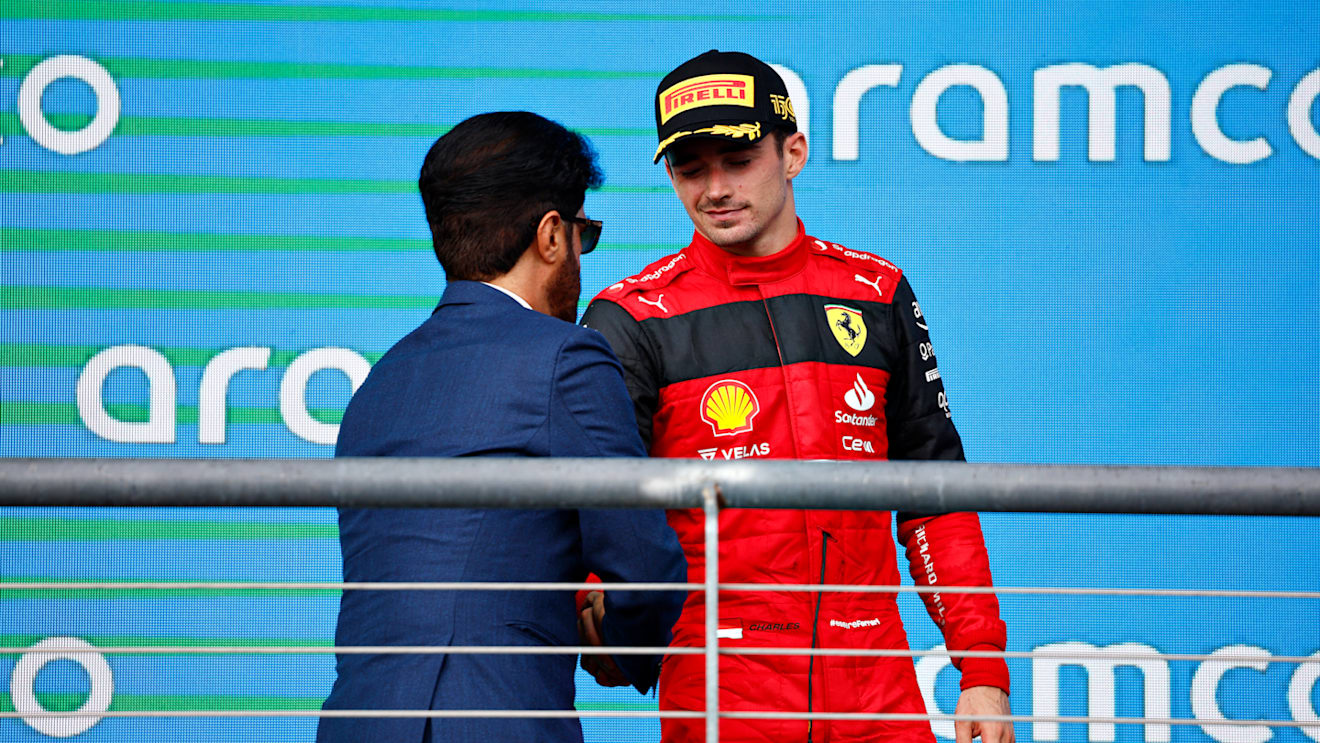 AUSTIN, TEXAS - OCTOBER 23: Third placed Charles Leclerc of Monaco and Ferrari celebrates on the podium following the F1 Grand Prix of USA at Circuit of The Americas on October 23, 2022 in Austin, Texas. (Photo by Chris Graythen/Getty Images)
