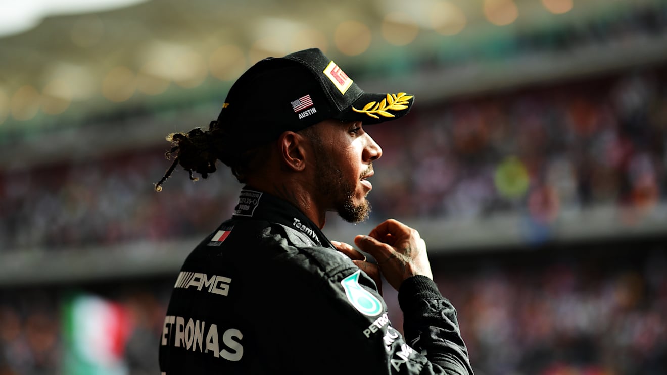 AUSTIN, TEXAS - OCTOBER 23: Second placed Lewis Hamilton of Great Britain and Mercedes celebrates on the podium following the F1 Grand Prix of USA at Circuit of The Americas on October 23, 2022 in Austin, Texas. (Photo by Mario Renzi - Formula 1/Formula 1 via Getty Images)