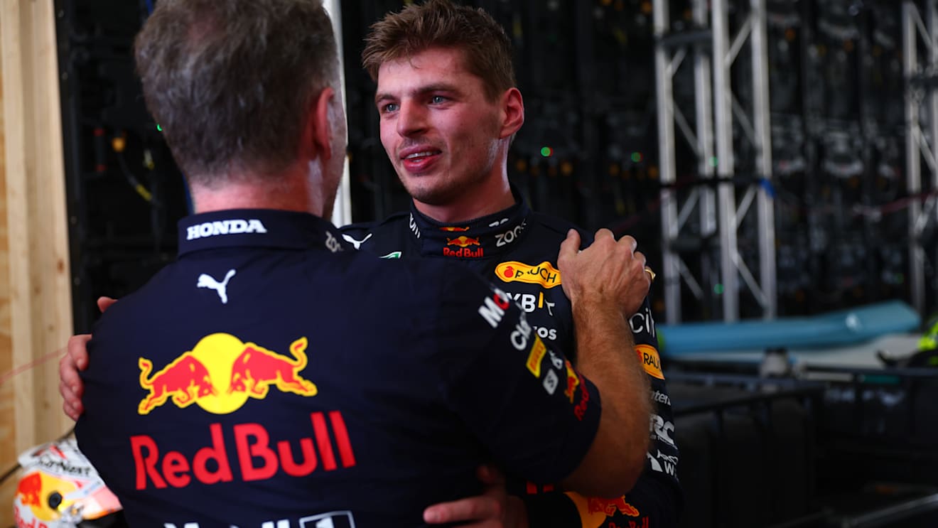 AUSTIN, TEXAS - OCTOBER 23: Race winner Max Verstappen of the Netherlands and Oracle Red Bull Racing and Red Bull Racing Team Principal Christian Horner embrace in parc ferme following the F1 Grand Prix of USA at Circuit of The Americas on October 23, 2022 in Austin, Texas. (Photo by Dan Istitene - Formula 1/Formula 1 via Getty Images)