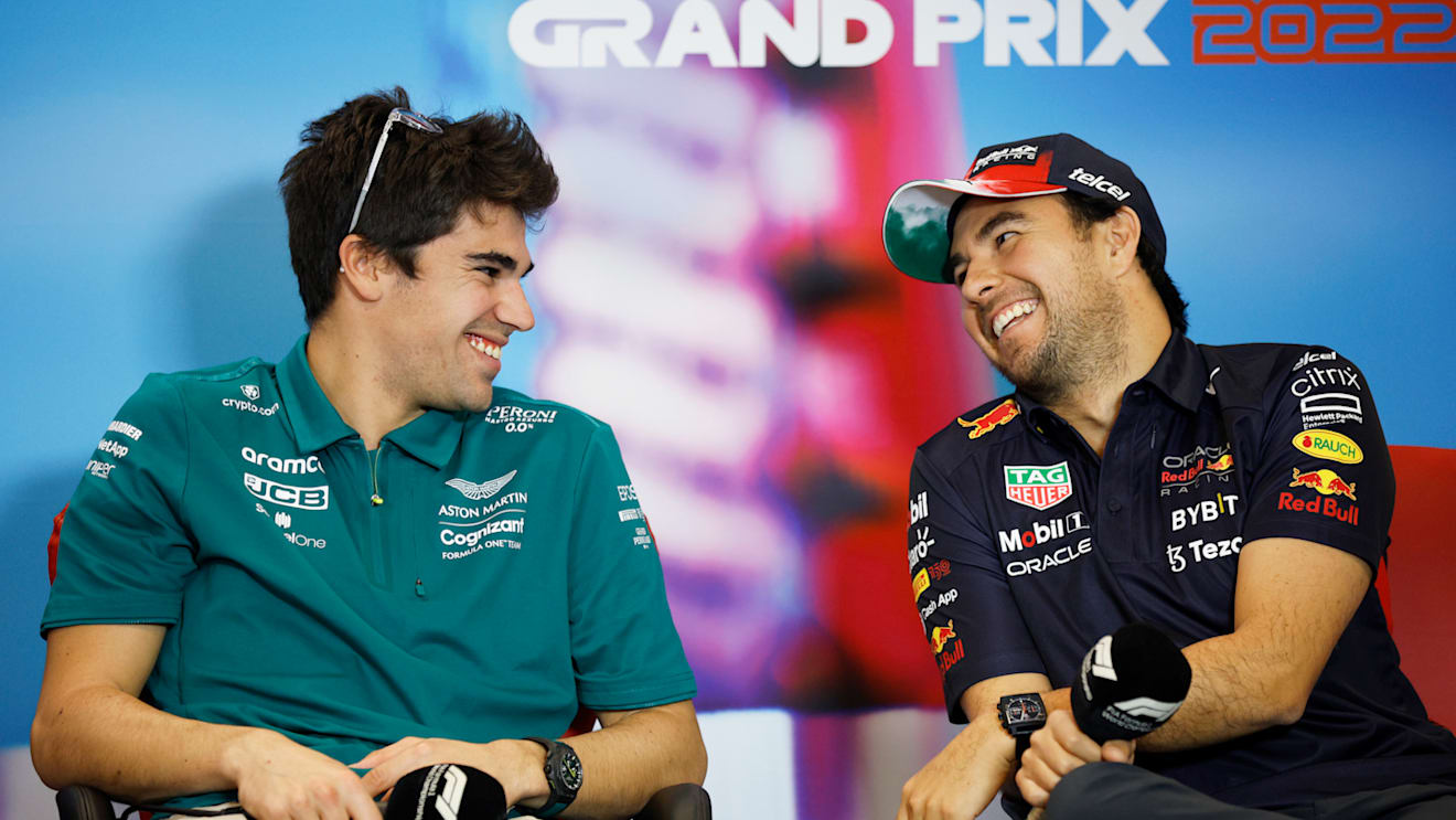 AUSTIN, TEXAS - OCTOBER 20: Lance Stroll of Canada and Aston Martin F1 Team and Sergio Perez of Mexico and Oracle Red Bull Racing talk in the Drivers Press Conference during previews ahead of the F1 Grand Prix of USA at Circuit of The Americas on October 20, 2022 in Austin, Texas. (Photo by Jared C. Tilton/Getty Images)