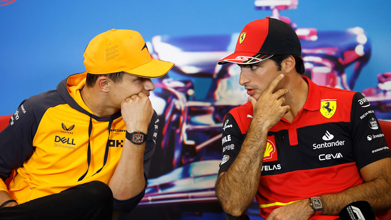 AUSTIN, TEXAS - OCTOBER 20: Lando Norris of Great Britain and McLaren and Carlos Sainz of Spain and Ferrari talk in the Drivers Press Conference during previews ahead of the F1 Grand Prix of USA at Circuit of The Americas on October 20, 2022 in Austin, Texas. (Photo by Jared C. Tilton/Getty Images)
