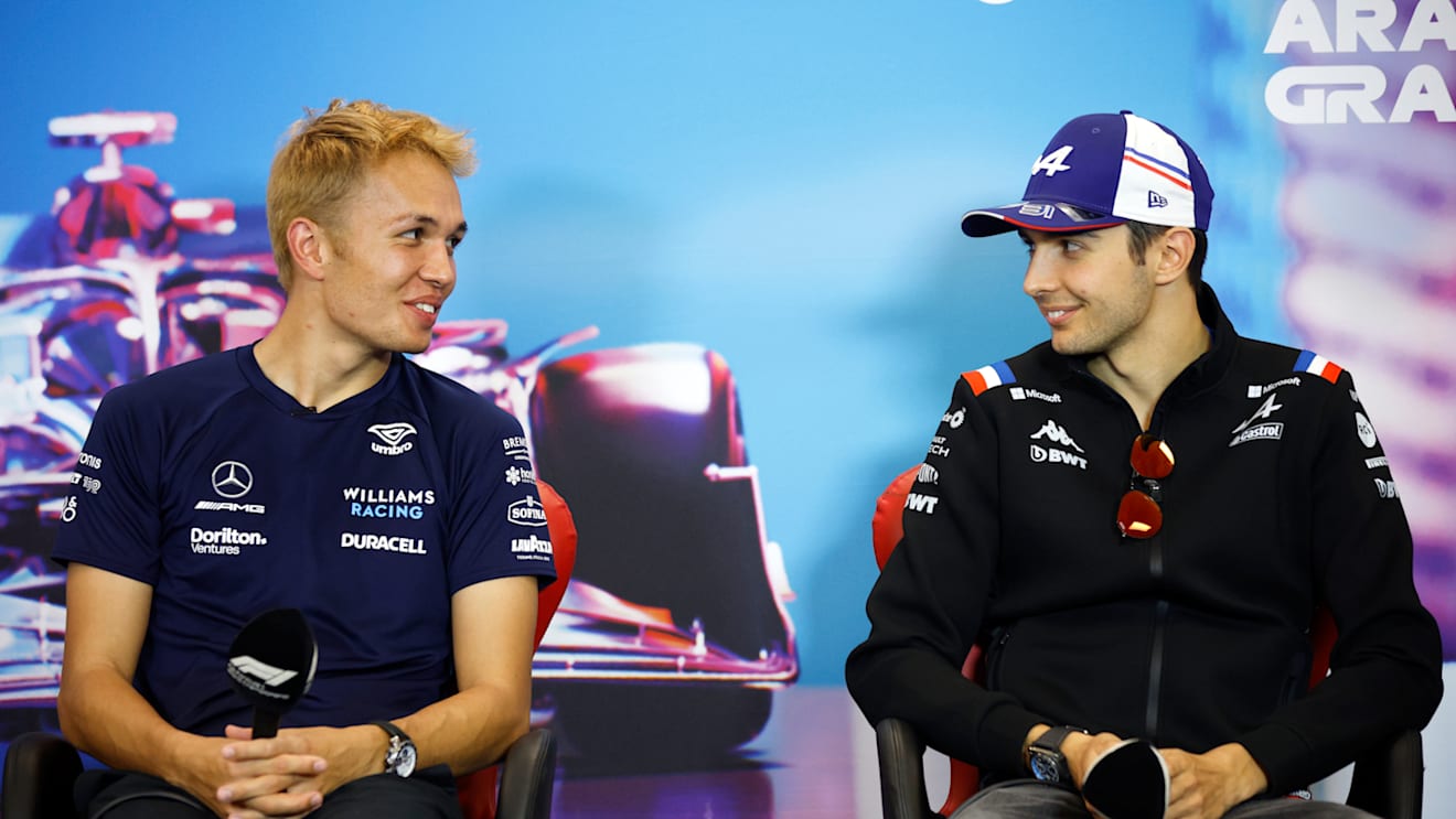 AUSTIN, TEXAS - OCTOBER 20: Alexander Albon of Thailand and Williams and Esteban Ocon of France and Alpine F1 talk in the Drivers Press Conference during previews ahead of the F1 Grand Prix of USA at Circuit of The Americas on October 20, 2022 in Austin, Texas. (Photo by Jared C. Tilton/Getty Images)