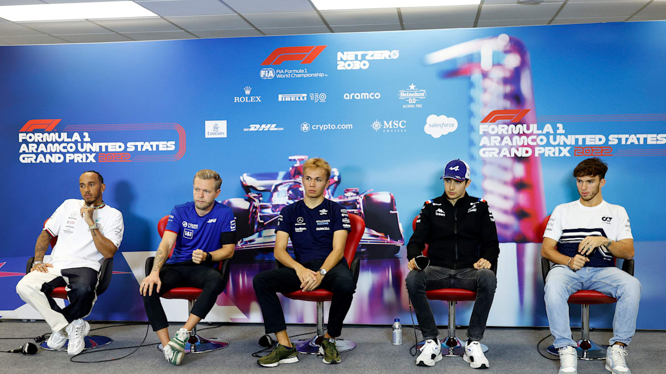 AUSTIN, TEXAS - OCTOBER 20: (L-R) Lewis Hamilton of Great Britain and Mercedes, Kevin Magnussen of Denmark and Haas F1, Alexander Albon of Thailand and Williams, Esteban Ocon of France and Alpine F1 and Pierre Gasly of France and Scuderia AlphaTauri attend the Drivers Press Conference during previews ahead of the F1 Grand Prix of USA at Circuit of The Americas on October 20, 2022 in Austin, Texas. (Photo by Jared C. Tilton/Getty Images)