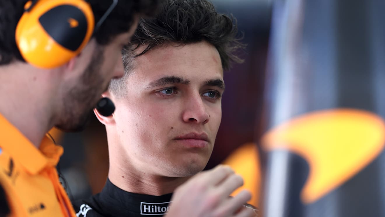 BAHRAIN, BAHRAIN - MARCH 03: Lando Norris of Great Britain driving the (4) McLaren MCL60 Mercedes looks on in the garage during practice ahead of the F1 Grand Prix of Bahrain at Bahrain International Circuit on March 03, 2023 in Bahrain, Bahrain. (Photo by Lars Baron/Getty Images)