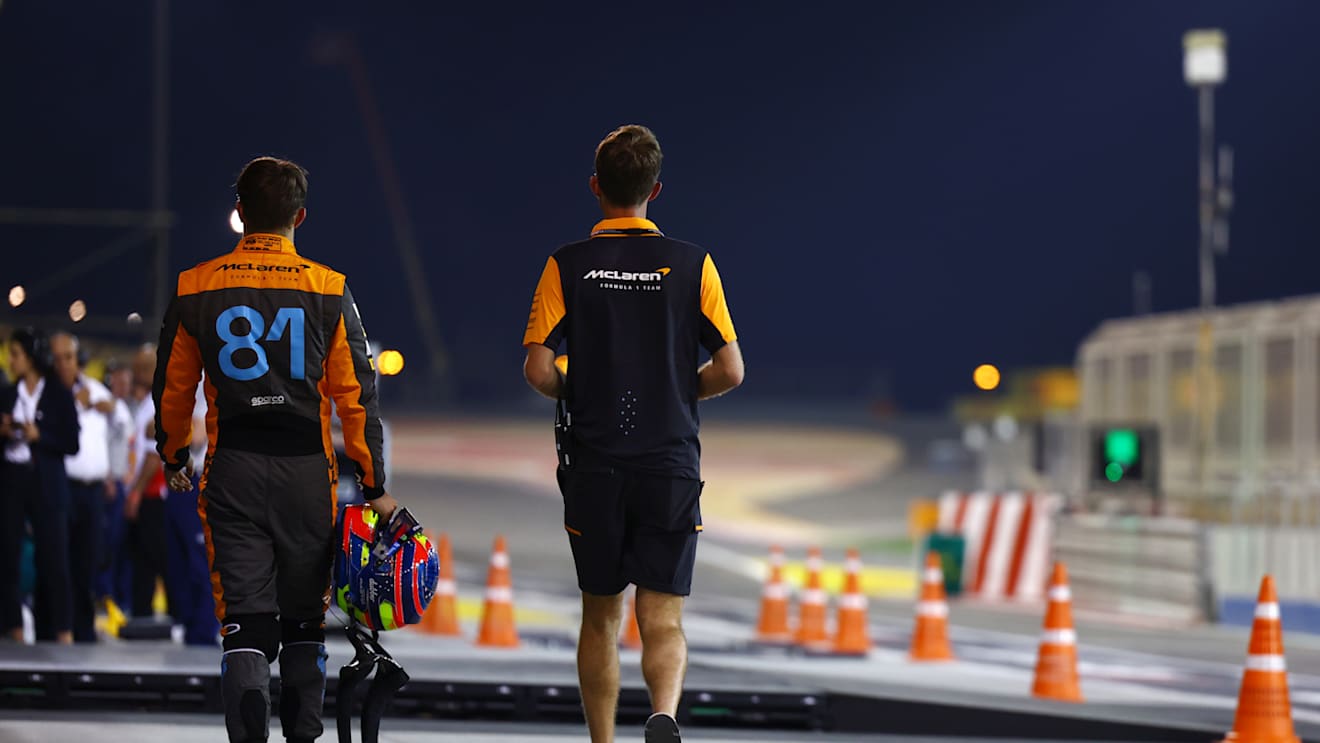 BAHRAIN, BAHRAIN - MARCH 04: 18th placed qualifier Oscar Piastri of Australia and McLaren walks in the Pitlane during qualifying ahead of the F1 Grand Prix of Bahrain at Bahrain International Circuit on March 04, 2023 in Bahrain, Bahrain. (Photo by Mark Thompson/Getty Images)