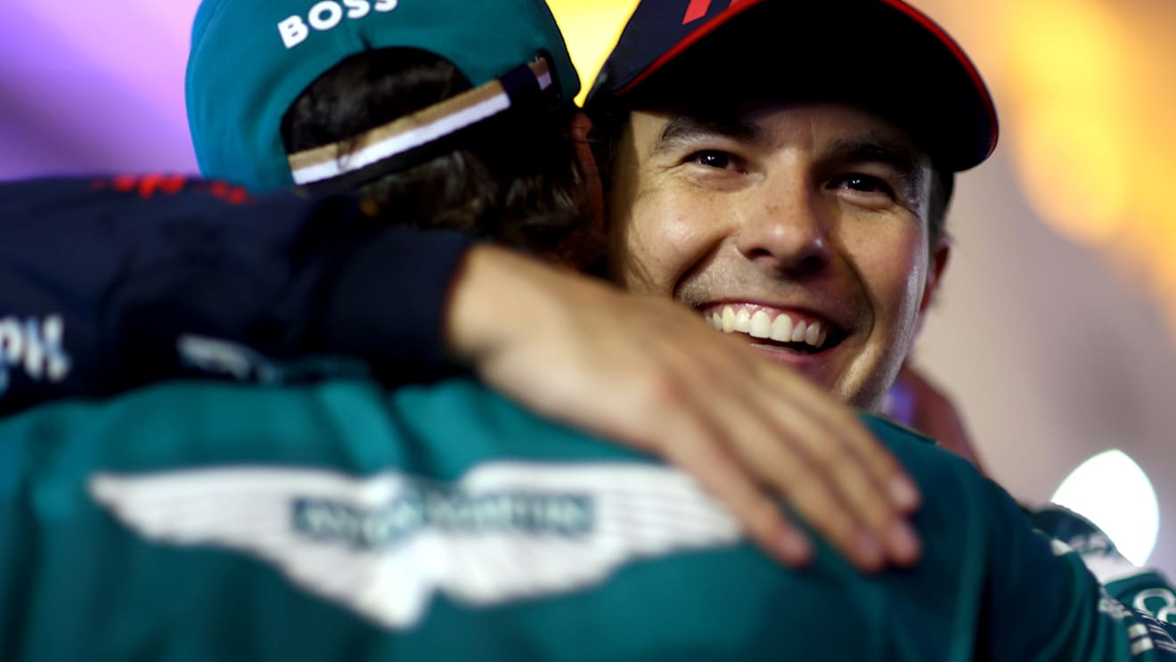 BAHRAIN, BAHRAIN - MARCH 05: Second placed Sergio Perez of Mexico and Oracle Red Bull Racing congratulates Third placed Fernando Alonso of Spain and Aston Martin F1 Team in parc ferme during the F1 Grand Prix of Bahrain at Bahrain International Circuit on March 05, 2023 in Bahrain, Bahrain. (Photo by Dan Istitene - Formula 1/Formula 1 via Getty Images)