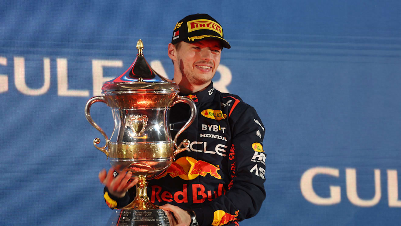 BAHRAIN, BAHRAIN - MARCH 05: Race winner Max Verstappen of the Netherlands and Oracle Red Bull Racing celebrates on the podium during the F1 Grand Prix of Bahrain at Bahrain International Circuit on March 05, 2023 in Bahrain, Bahrain. (Photo by Lars Baron/Getty Images)