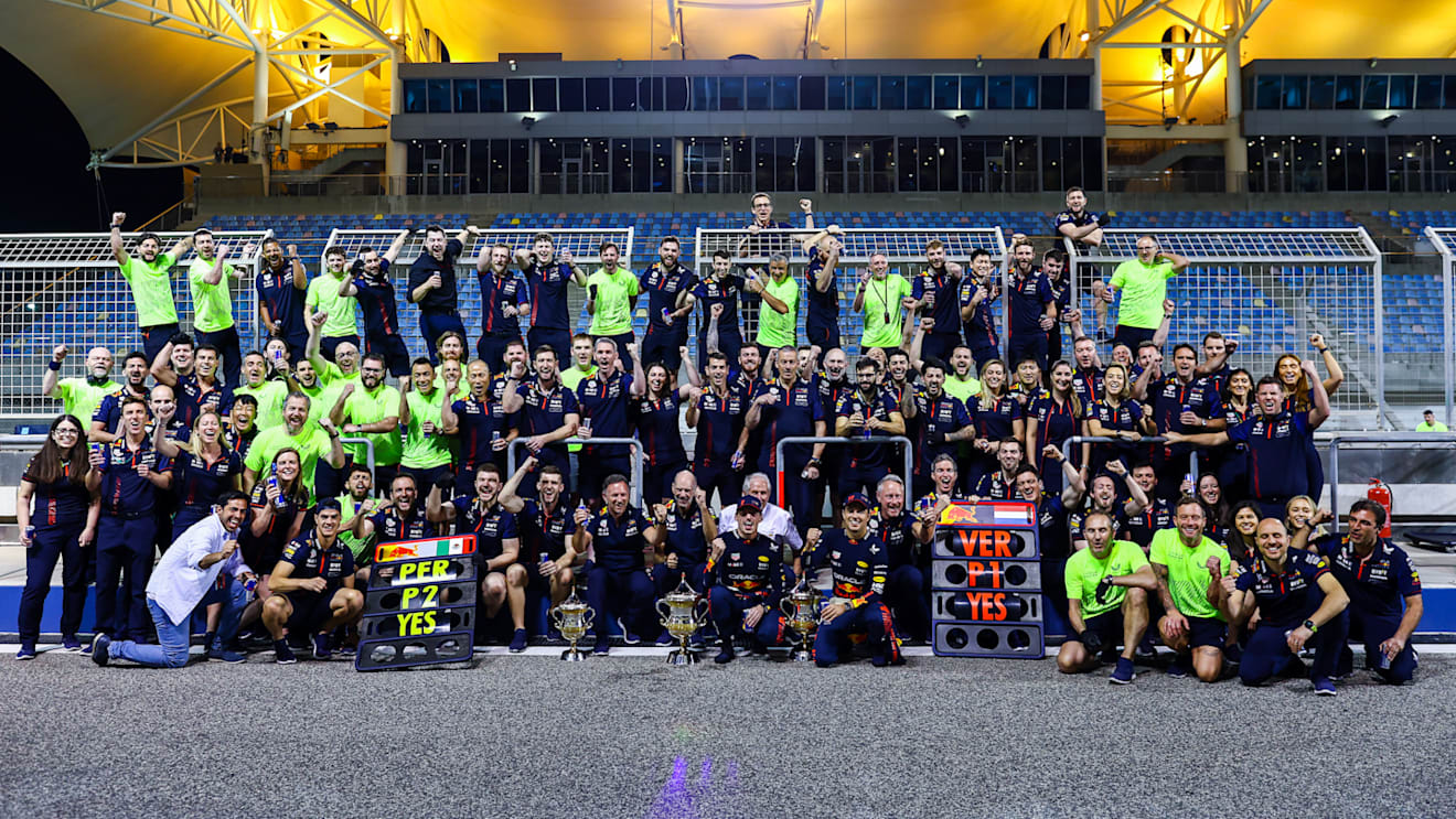 BAHRAIN, BAHRAIN - MARCH 05: Race winner Max Verstappen of the Netherlands and Oracle Red Bull Racing and Second placed Sergio Perez of Mexico and Oracle Red Bull Racing celebrate with their team after the F1 Grand Prix of Bahrain at Bahrain International Circuit on March 05, 2023 in Bahrain, Bahrain. (Photo by Mark Thompson/Getty Images)