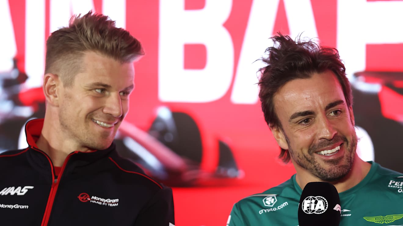 BAHRAIN, BAHRAIN - MARCH 02: Fernando Alonso of Spain and Aston Martin F1 Team and Nico Hulkenberg of Germany and Haas F1 look on in the Drivers Press Conference during previews ahead of the F1 Grand Prix of Bahrain at Bahrain International Circuit on March 02, 2023 in Bahrain, Bahrain. (Photo by Lars Baron/Getty Images)