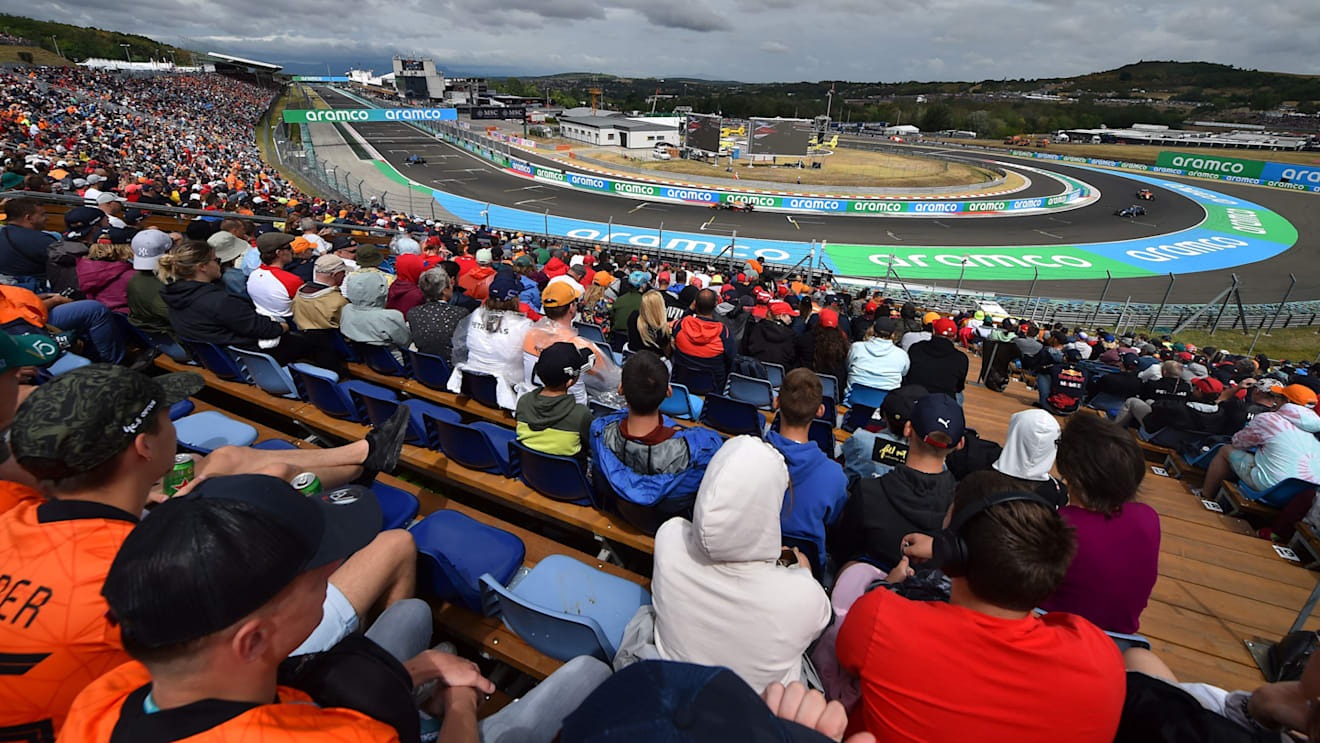 A general view shows spectators on the stands as they wait for the start of the Formula One Hungarian Grand Prix at the Hungaroring in Mogyorod near Budapest, Hungary, on July 31, 2022. (Photo by Ferenc ISZA / AFP) (Photo by FERENC ISZA/AFP via Getty Images)