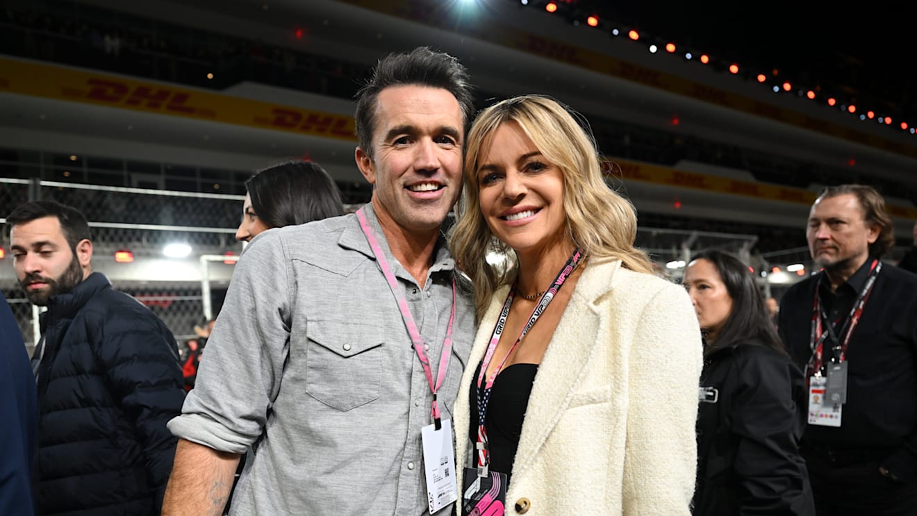 LAS VEGAS, NEVADA - NOVEMBER 18: Rob McElhenney and his wife Kaitlin Olson pose during the grid prior to the F1 Grand Prix of Las Vegas at Las Vegas Strip Circuit on November 18, 2023 in Las Vegas, Nevada, United States. (Photo by Tayfun Cokun/Anadolu via Getty Images)