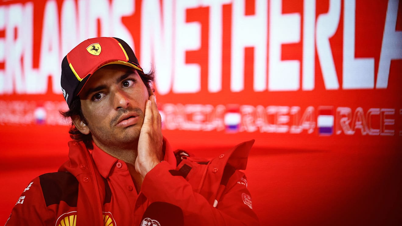 Ferrari's Spanish driver Carlos Sainz Jr gestures during a press conference ahead of the Dutch Formula One Grand Prix, in the coastal town of Zandvoort on August 24, 2023. The 2023 Dutch Grand Prix will take place on August 27, 2023. (Photo by Simon Wohlfahrt / AFP) (Photo by SIMON WOHLFAHRT/AFP via Getty Images)