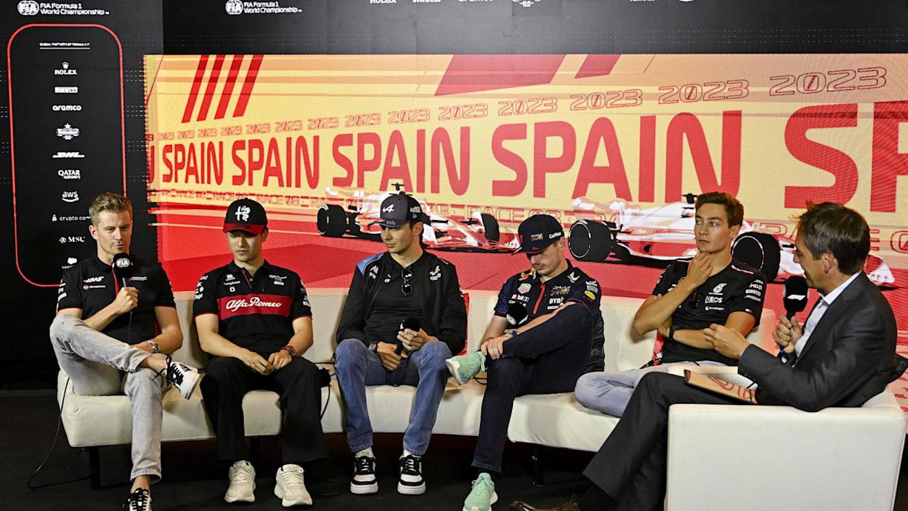 (From L) Haas F1 Team's German driver Nico Hulkenberg, Alfa Romeo's Chinese driver Zhou Guanyu, Alpine's French driver Esteban Ocon, Red Bull Racing's Dutch driver Max Verstappen and Mercedes' British driver George Russell address a press conference ahead of the Spanish Formula One Grand Prix at the Circuit de Catalunya on June 1, 2023 in Montmelo, on the outskirts of Barcelona. (Photo by JAVIER SORIANO / AFP) (Photo by JAVIER SORIANO/AFP via Getty Images)