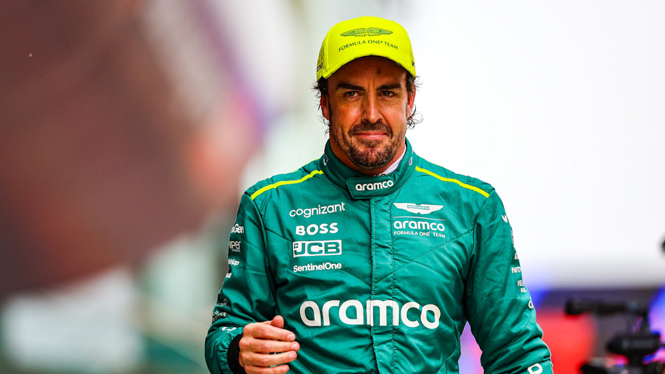SHANGHAI, CHINA - APRIL 20: Fernando Alonso of Spain and Aston Martin F1 Team walks in parc ferme after qualifying ahead of the F1 Grand Prix of China at Shanghai International Circuit on April 20, 2024 in Shanghai, China. (Photo by Kym Illman/Getty Images)