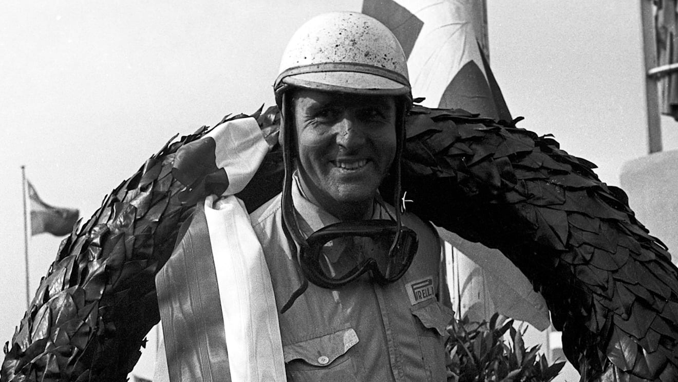 Farina revels in victory at the Nurburgring in 1953, taking his career tally to five