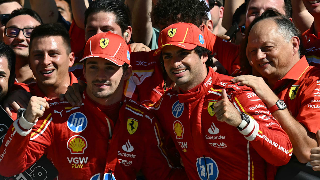 (L-R) Ferrari's Monegasque driver Charles Leclerc, Ferrari's Spanish driver Carlos Sainz Jr. and Ferrari's French team principal FrÃ©dÃ©ric Vasseur celebrate with teammates after Leclerc won the United States Formula One Grand Prix at the Circuit of the Americas in Austin, Texas, on October 20, 2024. (Photo by Patrick T. Fallon / AFP) (Photo by PATRICK T. FALLON/AFP via Getty Images)