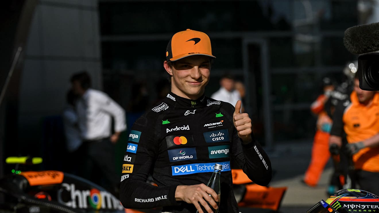 TOPSHOT - McLaren's Australian driver Oscar Piastri gives a thumbs as he celebrates taking pole position in the qualifying session of the Formula One Chinese Grand Prix at the Shanghai International Circuit in Shanghai on March 22, 2025. (Photo by GREG BAKER / AFP) (Photo by GREG BAKER/AFP via Getty Images)