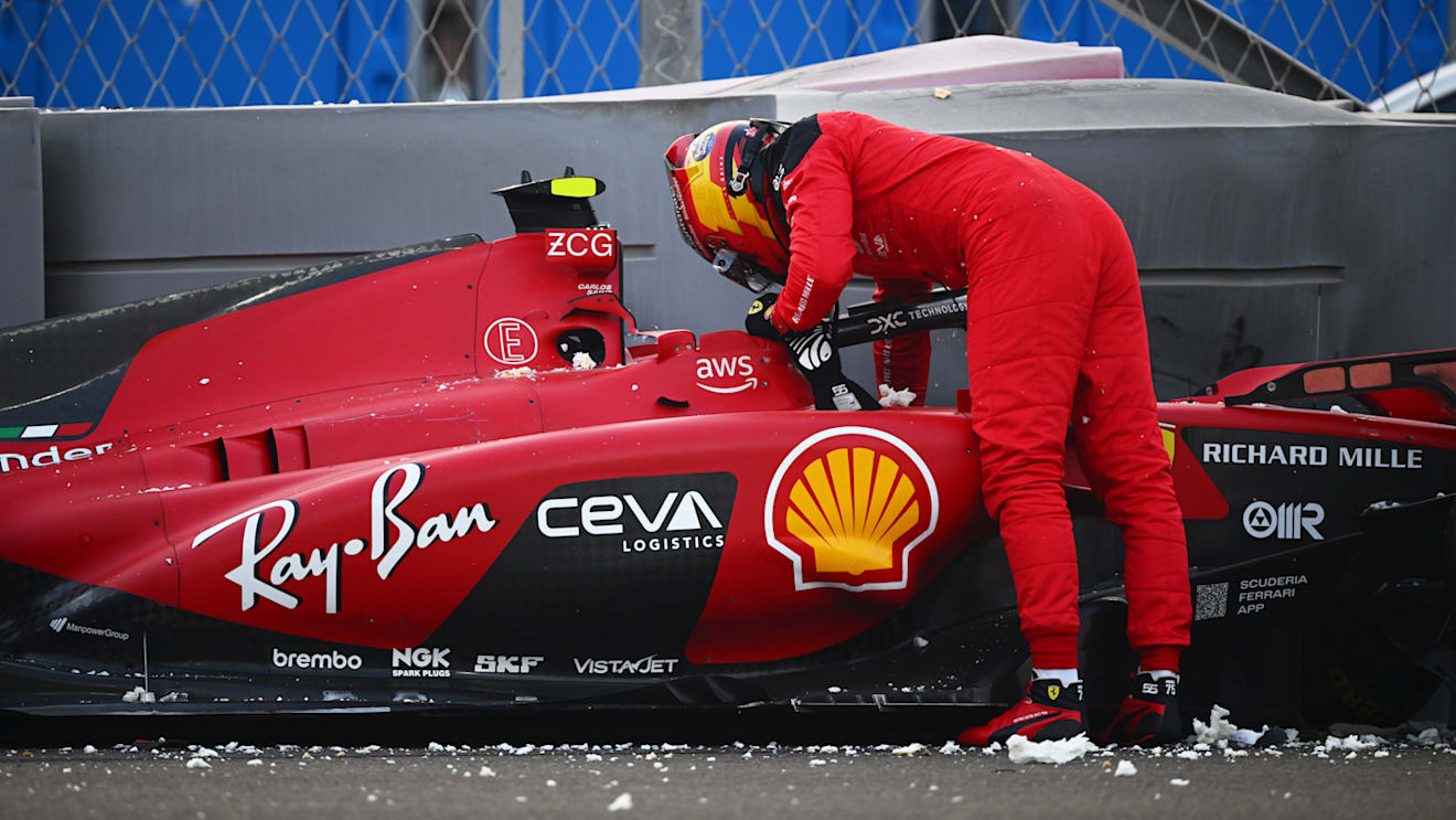ABU DHABI, UNITED ARAB EMIRATES - NOVEMBER 24: Carlos Sainz of Spain and Ferrari walks from his car after crashing during practice ahead of the F1 Grand Prix of Abu Dhabi at Yas Marina Circuit on November 24, 2023 in Abu Dhabi, United Arab Emirates. (Photo by Clive Mason - Formula 1/Formula 1 via Getty Images)