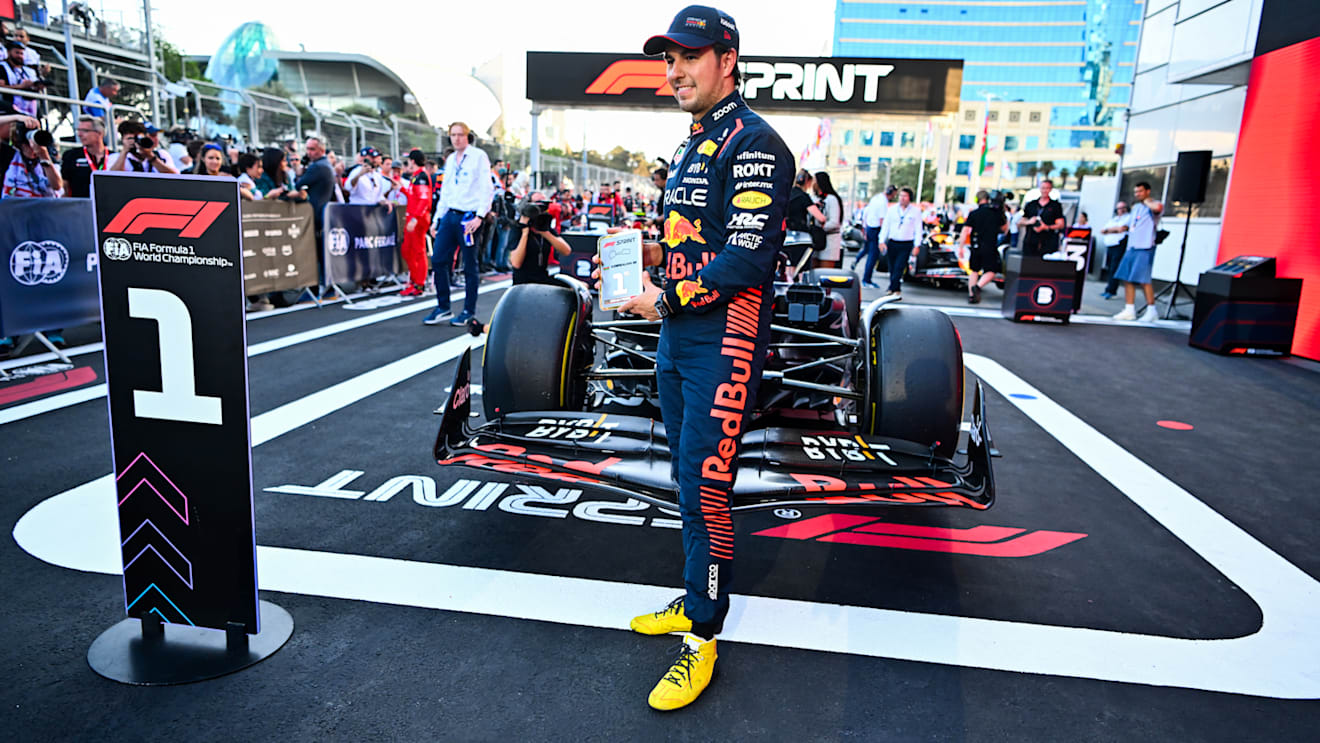 BAKU, AZERBAIJAN - APRIL 29: Sprint winner Sergio Perez of Mexico and Oracle Red Bull Racing celebrates in parc ferme  during the Sprint ahead of the F1 Grand Prix of Azerbaijan at Baku City Circuit on April 29, 2023 in Baku, Azerbaijan. (Photo by Dan Mullan - Formula 1/Formula 1 via Getty Images)