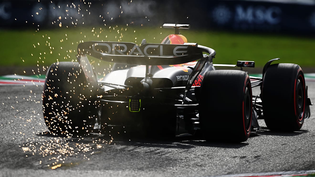 SUZUKA, JAPAN - SEPTEMBER 23: Sparks fly behind Max Verstappen of the Netherlands driving the (1) Oracle Red Bull Racing RB19 during qualifying ahead of the F1 Grand Prix of Japan at Suzuka International Racing Course on September 23, 2023 in Suzuka, Japan. (Photo by Clive Mason/Getty Images)