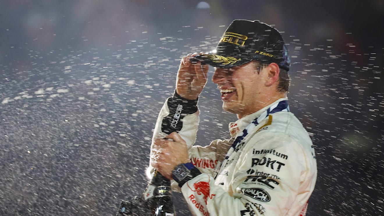 LAS VEGAS, NEVADA - NOVEMBER 18: Race winner Max Verstappen of the Netherlands and Oracle Red Bull Racing celebrates on the podium during the F1 Grand Prix of Las Vegas at Las Vegas Strip Circuit on November 18, 2023 in Las Vegas, Nevada. (Photo by Chris Graythen/Getty Images)