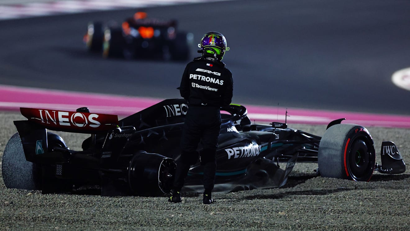 LUSAIL CITY, QATAR - OCTOBER 08: Lewis Hamilton of Great Britain and Mercedes looks on after retiring from the race during the F1 Grand Prix of Qatar at Lusail International Circuit on October 08, 2023 in Lusail City, Qatar. (Photo by Mark Thompson/Getty Images)