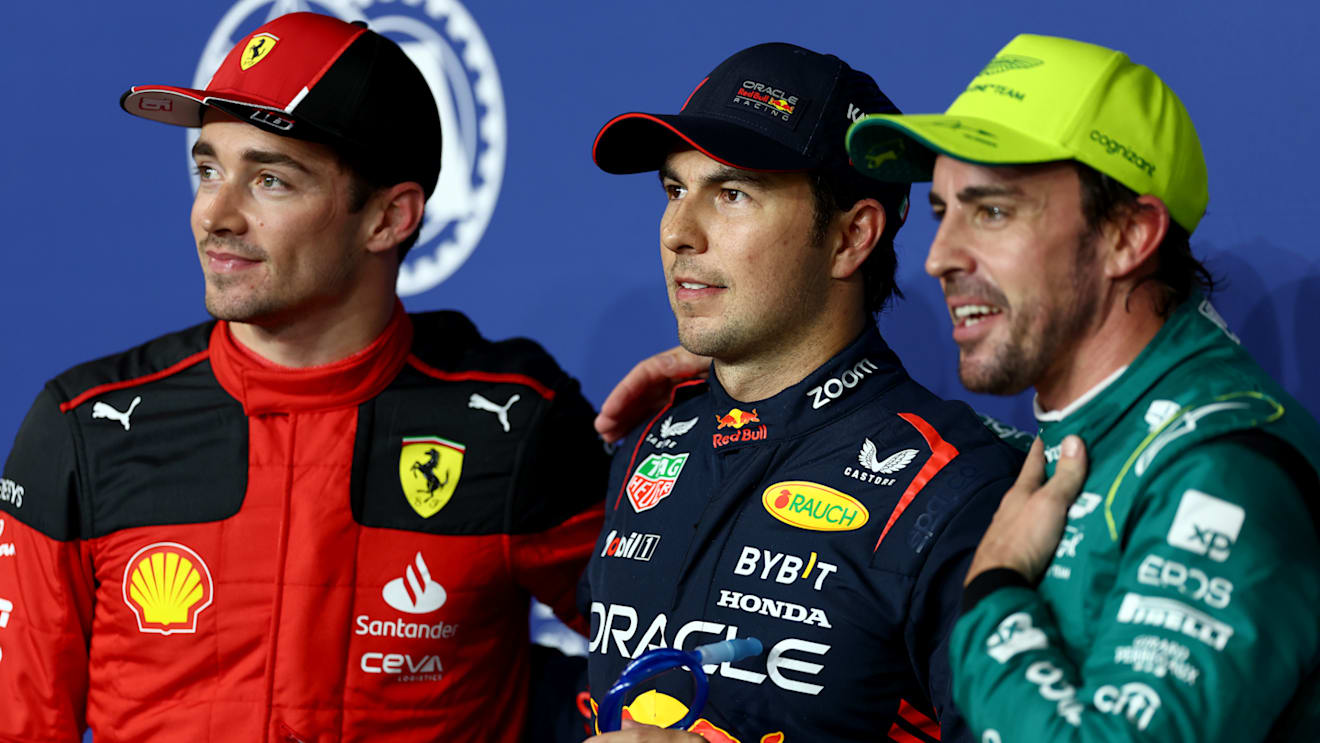 JEDDAH, SAUDI ARABIA - MARCH 18: Pole position qualifier Sergio Perez of Mexico and Oracle Red Bull Racing (C), Second placed qualifier Charles Leclerc of Monaco and Ferrari (L) and Third placed qualifier Fernando Alonso of Spain and Aston Martin F1 Team (R) pose for a photo in parc ferme during qualifying ahead of the F1 Grand Prix of Saudi Arabia at Jeddah Corniche Circuit on March 18, 2023 in Jeddah, Saudi Arabia. (Photo by Dan Istitene - Formula 1/Formula 1 via Getty Images)