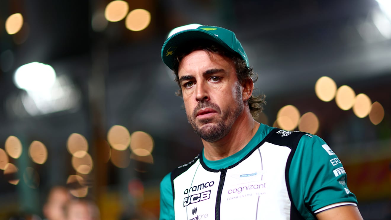SINGAPORE, SINGAPORE - SEPTEMBER 17: Fernando Alonso of Spain and Aston Martin F1 Team looks on from the grid prior to the F1 Grand Prix of Singapore at Marina Bay Street Circuit on September 17, 2023 in Singapore, Singapore. (Photo by Dan Istitene - Formula 1/Formula 1 via Getty Images)