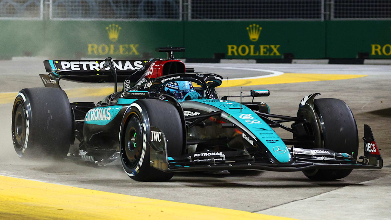 SINGAPORE, SINGAPORE - SEPTEMBER 22: George Russell of Great Britain driving the (63) Mercedes AMG Petronas F1 Team W15 runs wide during the F1 Grand Prix of Singapore at Marina Bay Street Circuit on September 22, 2024 in Singapore, Singapore. (Photo by Clive Rose - Formula 1/Formula 1 via Getty Images)