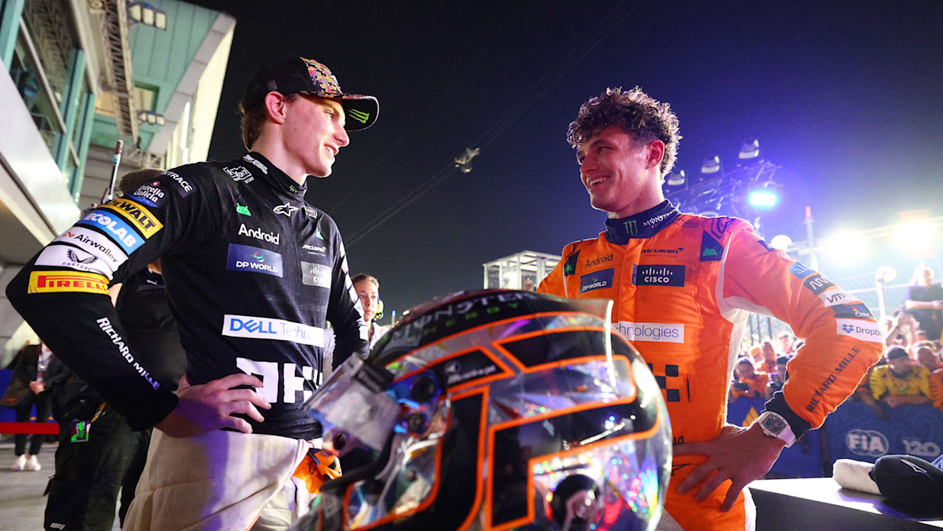 SINGAPORE, SINGAPORE - SEPTEMBER 22: Race winner Lando Norris of Great Britain and McLaren and Third placed Oscar Piastri of Australia driving the (81) McLaren MCL38 Mercedes celebrate in parc ferme during the F1 Grand Prix of Singapore at Marina Bay Street Circuit on September 22, 2024 in Singapore, Singapore. (Photo by Clive Rose - Formula 1/Formula 1 via Getty Images)