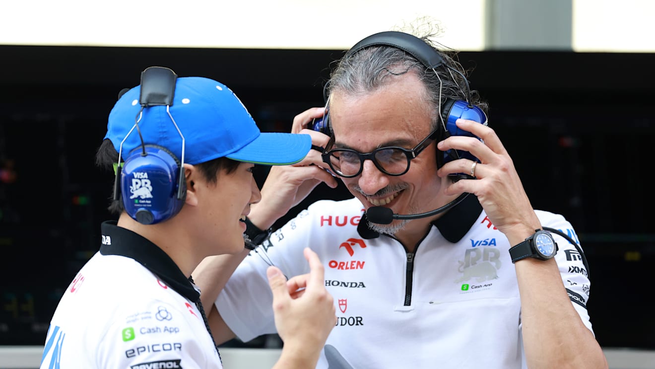 ABU DHABI, UNITED ARAB EMIRATES - DECEMBER 06: Yuki Tsunoda of Japan and Visa Cash App RB talks with Laurent Mekies, Team Principal of Visa Cash App RB on the pitwall during practice ahead of the F1 Grand Prix of Abu Dhabi at Yas Marina Circuit on December 06, 2024 in Abu Dhabi, United Arab Emirates. (Photo by Bryn Lennon - Formula 1/Formula 1 via Getty Images)