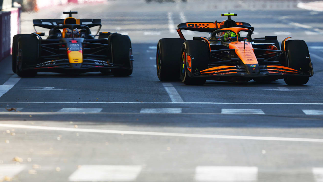 BAKU, AZERBAIJAN - SEPTEMBER 15: Lando Norris of Great Britain driving the (4) McLaren MCL38 Mercedes leads Max Verstappen of the Netherlands driving the (1) Oracle Red Bull Racing RB20 during the F1 Grand Prix of Azerbaijan at Baku City Circuit on September 15, 2024 in Baku, Azerbaijan. (Photo by Joe Portlock - Formula 1/Formula 1 via Getty Images)
