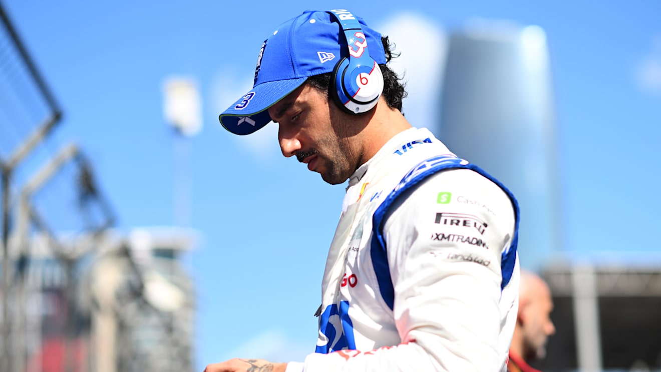 BAKU, AZERBAIJAN - SEPTEMBER 15: Daniel Ricciardo of Australia and Visa Cash App RB looks on, on the grid during the F1 Grand Prix of Azerbaijan at Baku City Circuit on September 15, 2024 in Baku, Azerbaijan. (Photo by Rudy Carezzevoli/Getty Images)