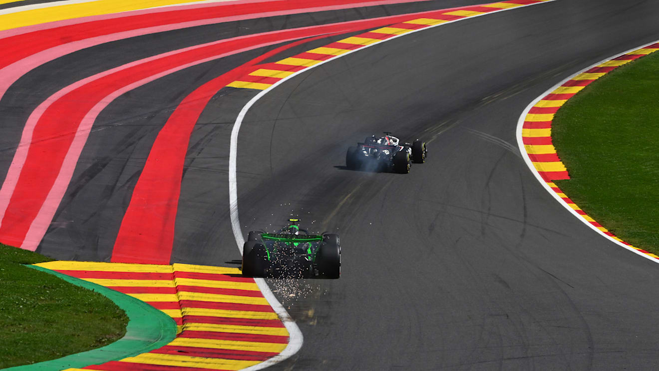 SPA, BELGIUM - JULY 28: Sparks fly behind Zhou Guanyu of China driving the (24) Kick Sauber C44 Ferrari during the F1 Grand Prix of Belgium at Circuit de Spa-Francorchamps on July 28, 2024 in Spa, Belgium. (Photo by Rudy Carezzevoli/Getty Images)