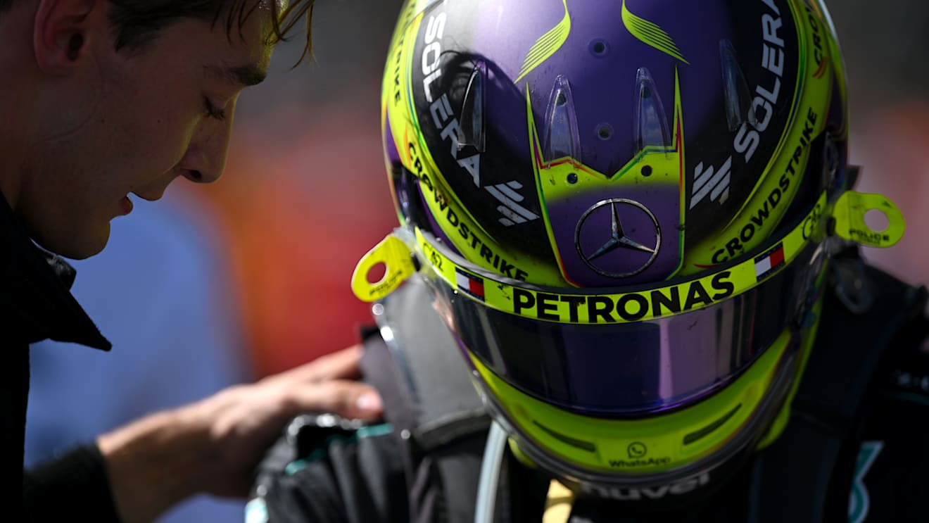 SPA, BELGIUM - JULY 28: Second placed Lewis Hamilton of Great Britain and Mercedes talks with Race winner George Russell of Great Britain and Mercedes in parc ferme during the F1 Grand Prix of Belgium at Circuit de Spa-Francorchamps on July 28, 2024 in Spa, Belgium. (Photo by Rudy Carezzevoli/Getty Images)