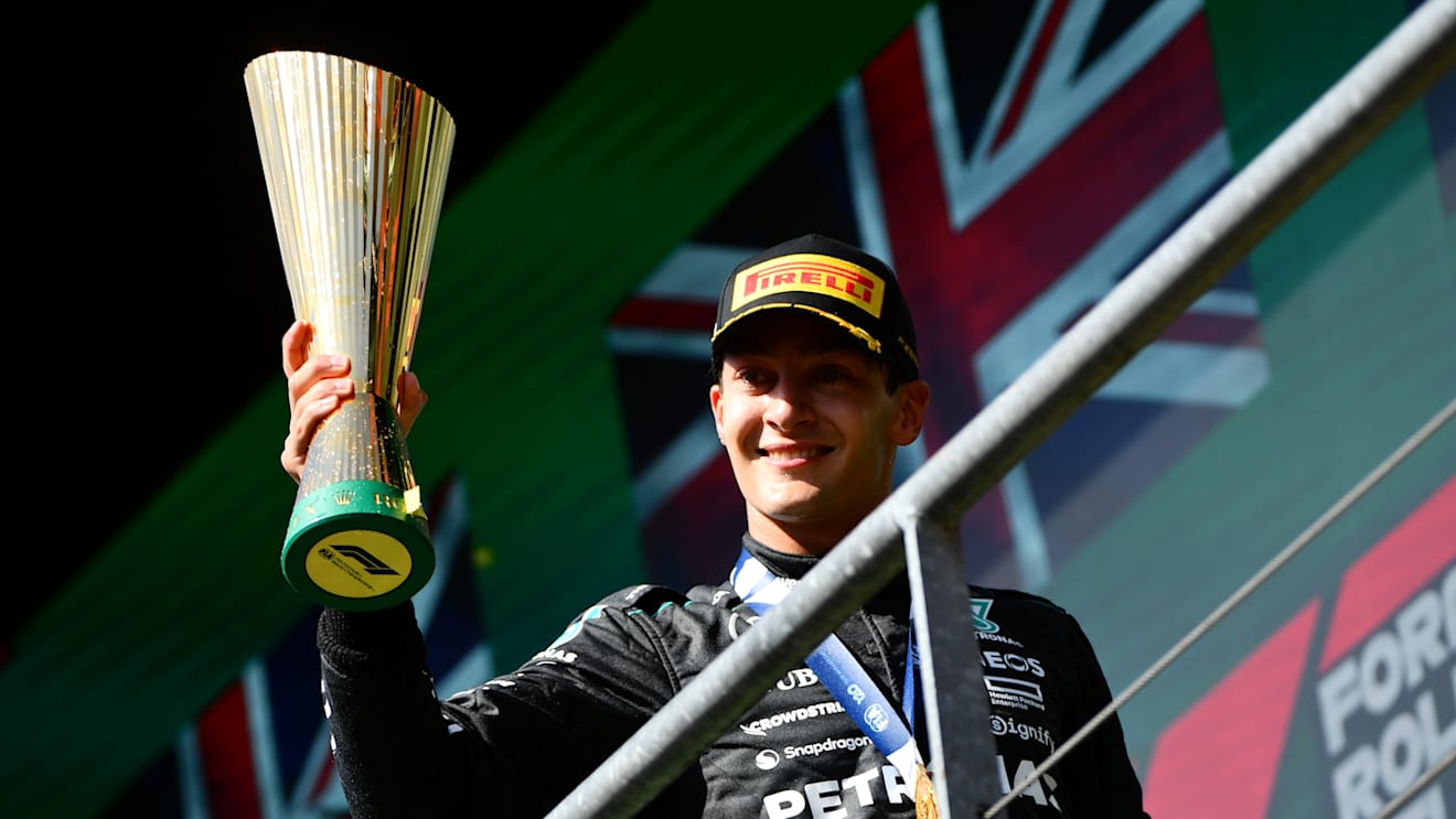 SPA, BELGIUM - JULY 28: Race winner George Russell of Great Britain and Mercedes celebrates on the podium during the F1 Grand Prix of Belgium at Circuit de Spa-Francorchamps on July 28, 2024 in Spa, Belgium. (Photo by James Sutton - Formula 1/Formula 1 via Getty Images)