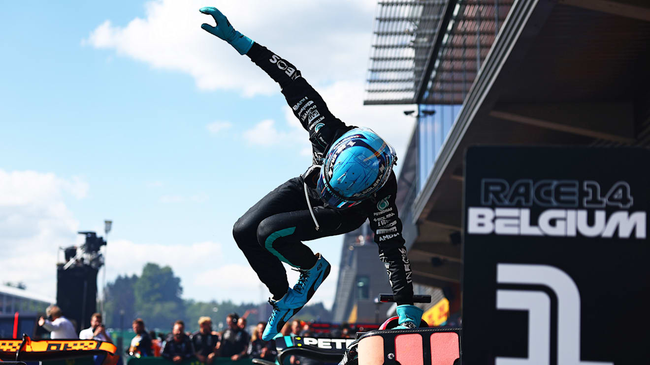 SPA, BELGIUM - JULY 28: Race winner George Russell of Great Britain and Mercedes jumps out of his car as he celebrates in parc ferme during the F1 Grand Prix of Belgium at Circuit de Spa-Francorchamps on July 28, 2024 in Spa, Belgium. (Photo by Bryn Lennon - Formula 1/Formula 1 via Getty Images)