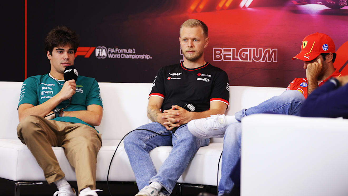 SPA, BELGIUM - JULY 25: Lance Stroll of Canada and Aston Martin F1 Team talks in the Drivers Press Conference with Kevin Magnussen of Denmark and Haas F1 during previews ahead of the F1 Grand Prix of Belgium at Circuit de Spa-Francorchamps on July 25, 2024 in Spa, Belgium. (Photo by Dean Mouhtaropoulos/Getty Images)